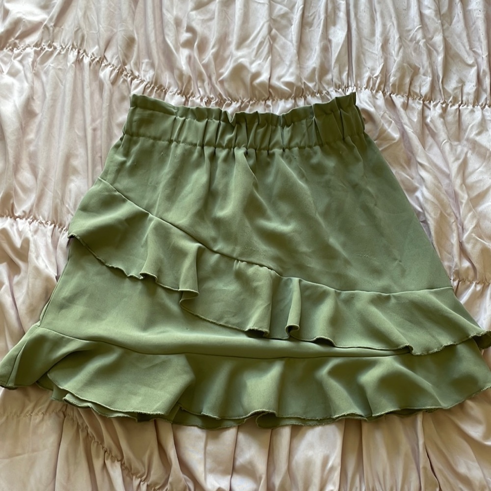 Brand by SHEIN, size M and its a green asymmetrical skirt